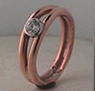 Red gold split shank engagement ring